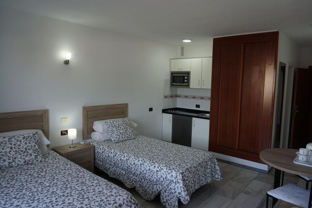 Foto de una habitación de Apartamentos Las Piramides Resort