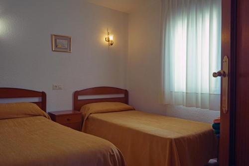 Foto de una habitación de Apartamentos Las Carabelas