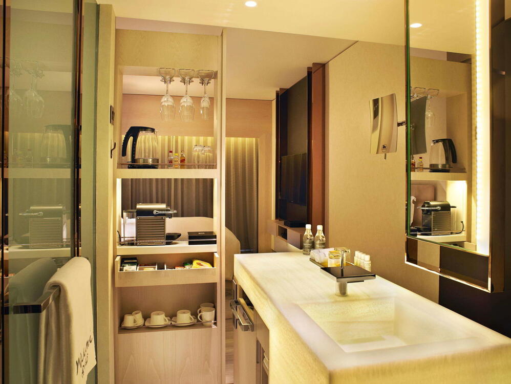 Foto del baño de Naumi Hotel