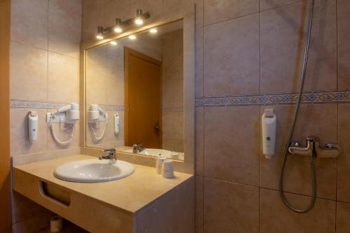 Foto del baño de Hotel Club Sunway Punta Prima