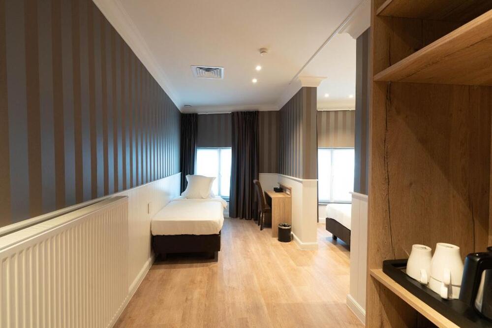 Foto de una habitación de Hotel du Theatre