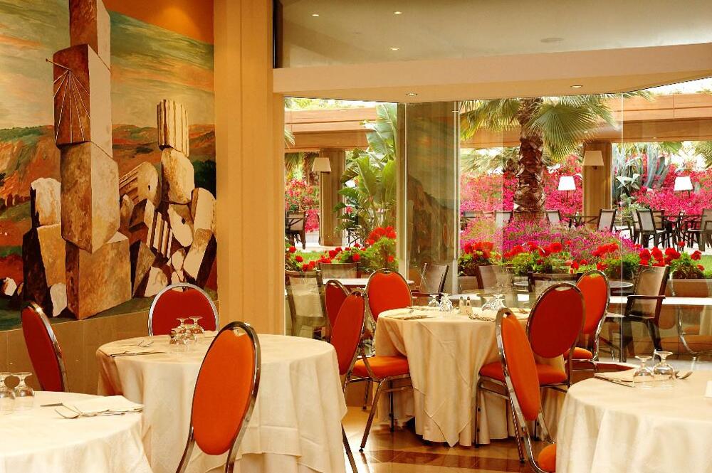 Foto de restauración de Hotel Acacia Resort Parco Dei Leoni