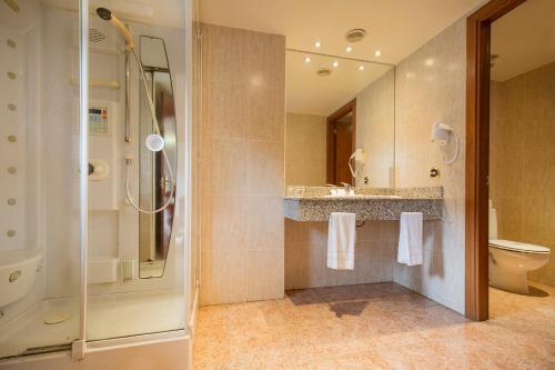 Foto del baño de Hotel Cervol
