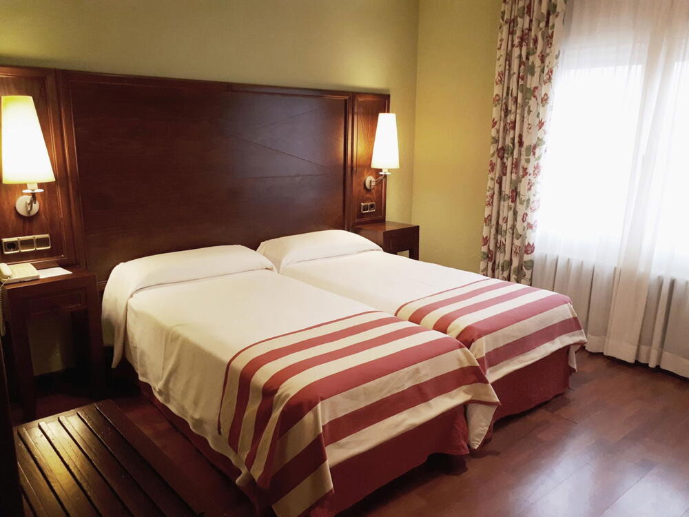 Foto de una habitación de Hotel Urogallo