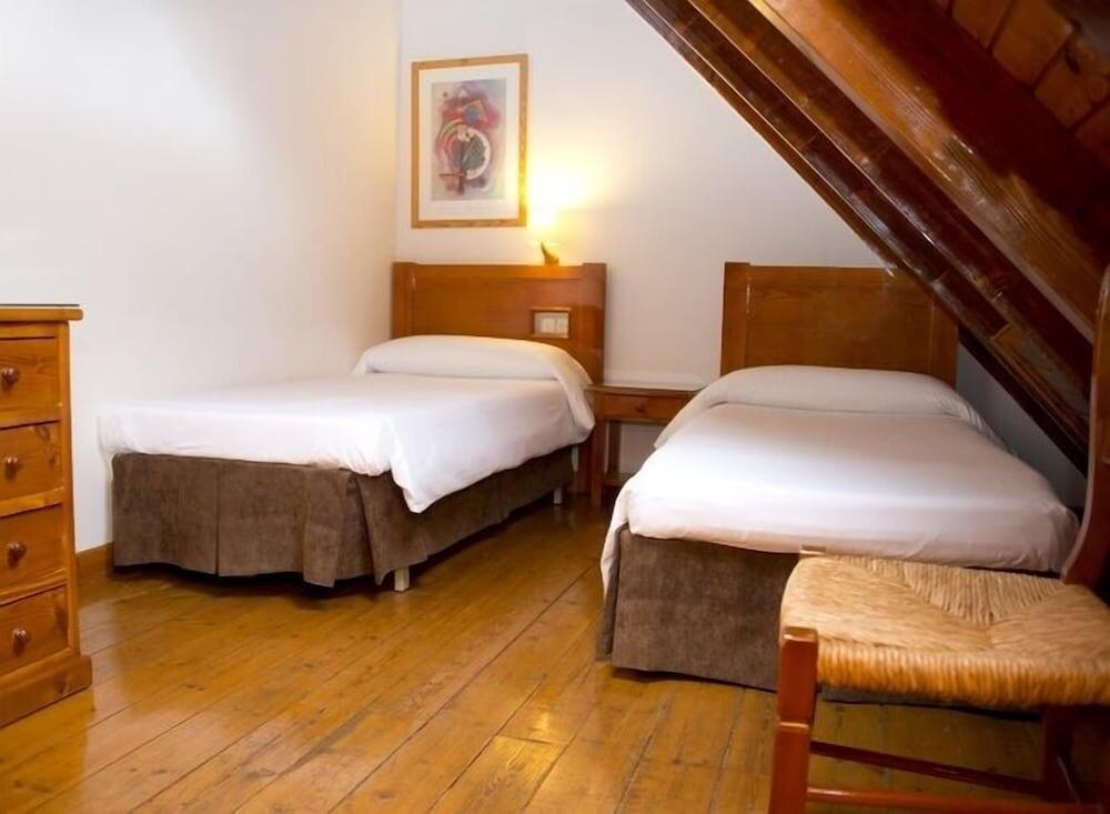Foto de una habitación de Hotel Apartamentos Vilagaros