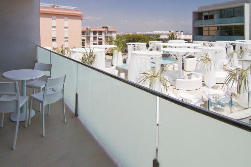 Foto de una habitación de Apartamentos Apolo Suites Rentalmar