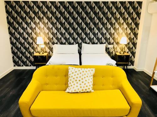 Foto de una habitación de Apartamentos Arriba by gaiarooms