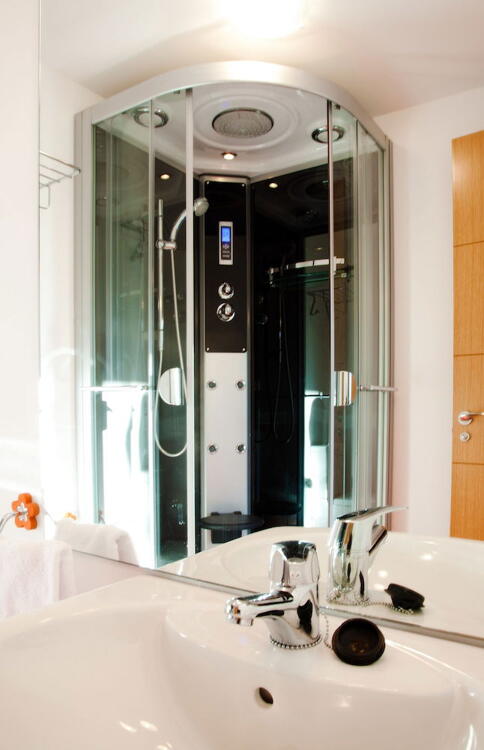 Foto del baño de Apartamentos Bahía de Boó
