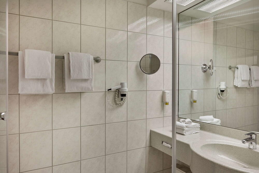 Foto del baño de H+ Hotel Stuttgart Herrenberg