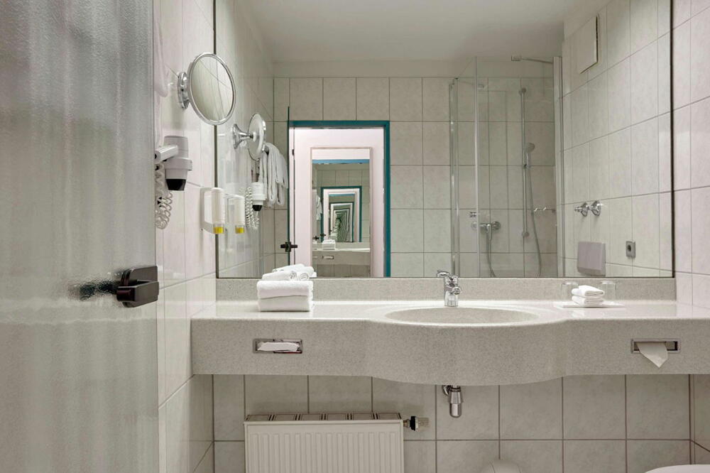 Foto del baño de H+ Hotel Stuttgart Herrenberg