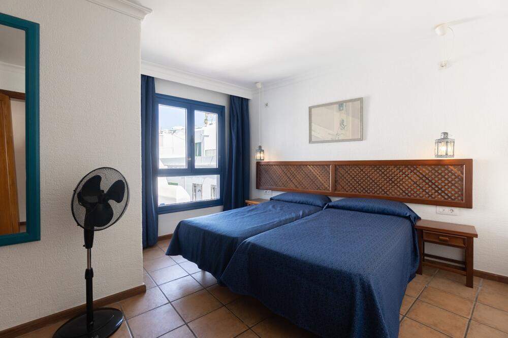 Foto de una habitación de Apartamentos Agua Marina