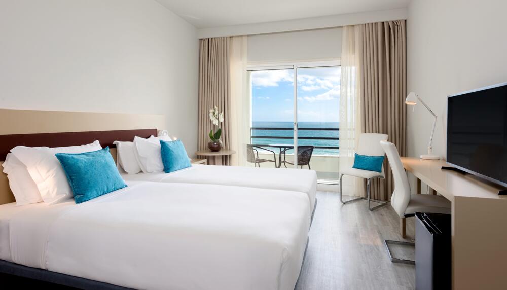 Foto de una habitación de Hotel TRYP by Wyndham Lisboa Caparica Mar