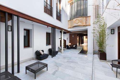 Foto del exterior de Aparthotel tuGuest Elvira Suites
