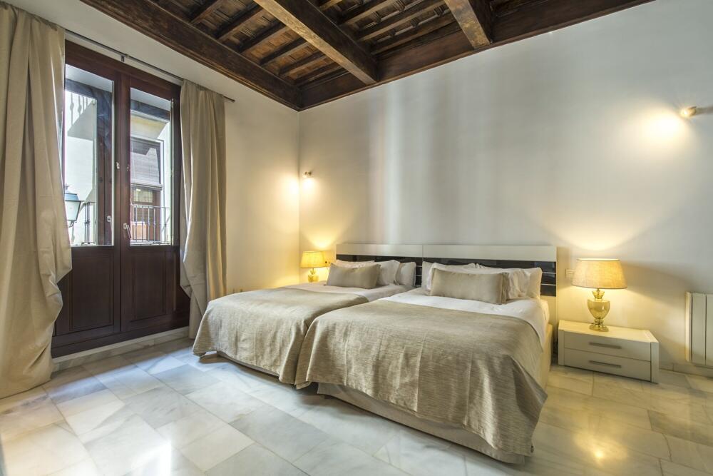 Foto de una habitación de Aparthotel tuGuest Elvira Suites