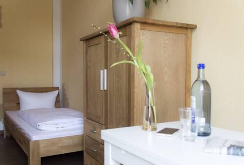 Foto de una habitación de Aparthotel Mitte