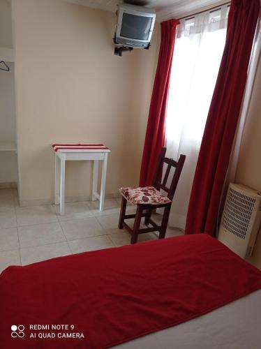 Foto de una habitación de Calafate Viejo Hostel