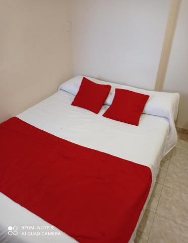 Foto de una habitación de Calafate Viejo Hostel