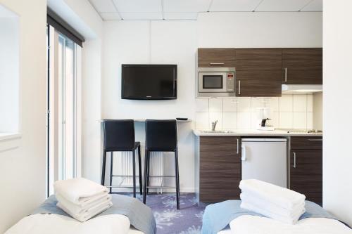 Foto de una habitación de ApartHotel Faber