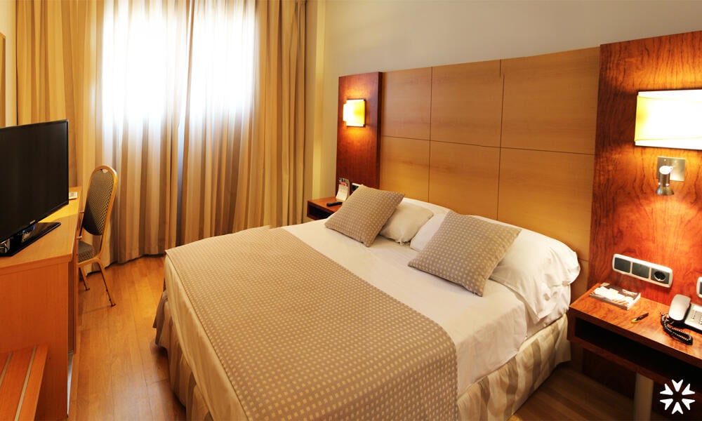 Foto de una habitación de Hotel Sercotel Gran Fama