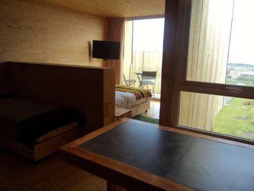 Foto de una habitación de Lodge del Mar