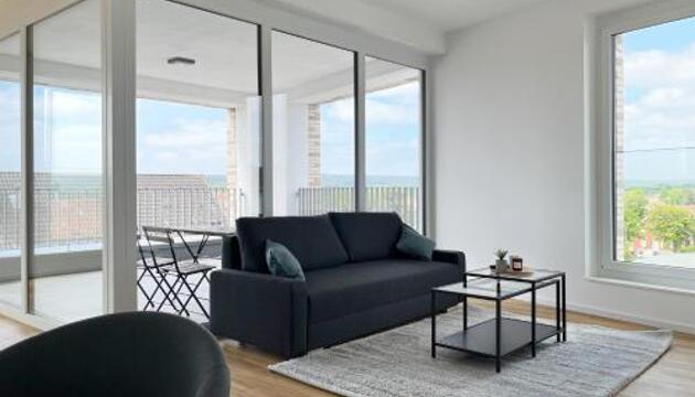 Foto de Moderne Apartments im Herzen der Stadt I private Tiefgarage mit Ladesäulen I home2share