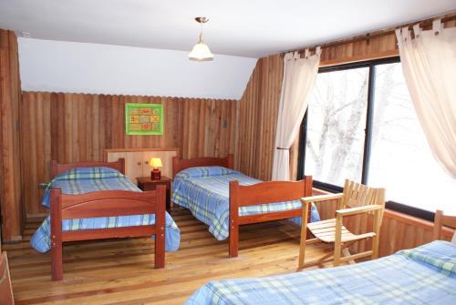 Foto de una habitación de Cabañas Bordenieve
