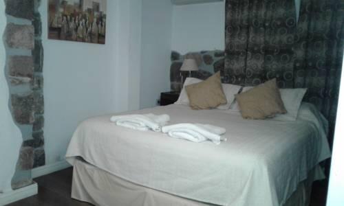 Foto de una habitación de Posada Summit Suites