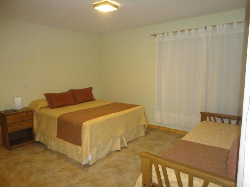 Foto de una habitación de Apartamentos Unquehue Dormis
