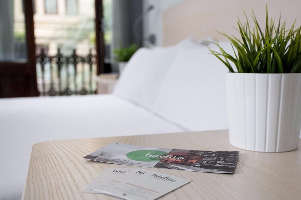 Foto de una habitación de Hostal Oliveira Rooms