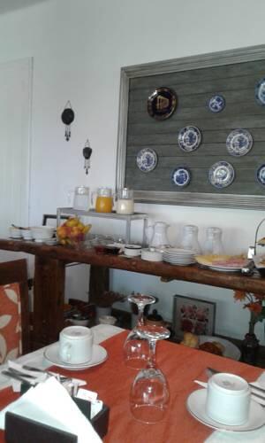 Foto de restauración de Posada Summit Suites