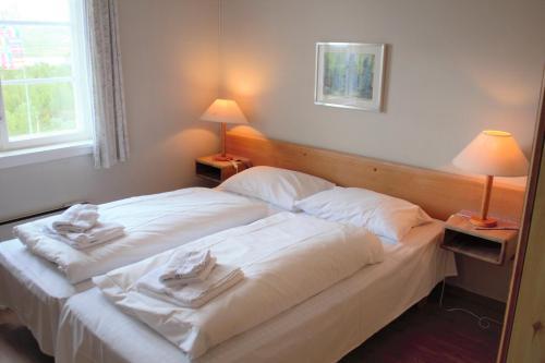 Foto de una habitación de Torsetlia Hotel