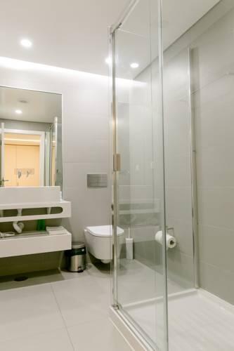 Foto del baño de Apartamentos Loving Chiado