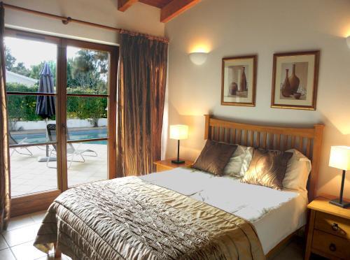 Foto de una habitación de AlmaVerde Village &amp;amp; Spa Resort