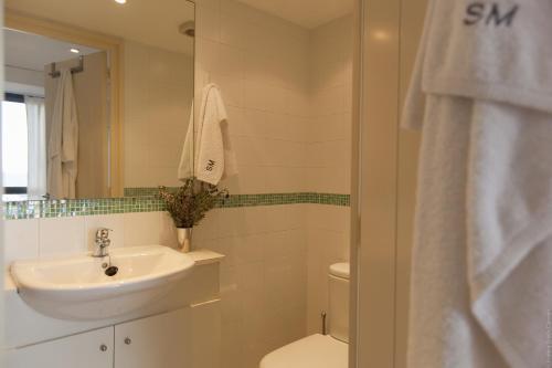 Foto del baño de Apartamentos Stella Maris