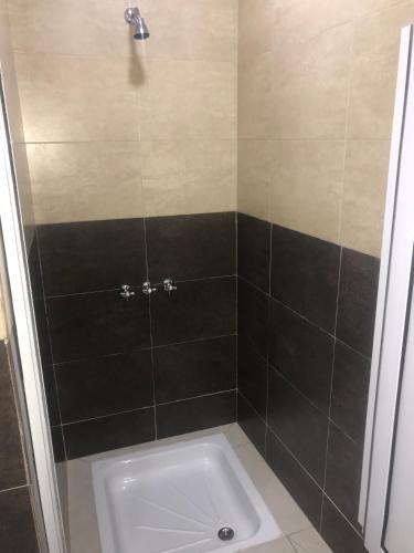 Foto del baño de Ambay Suites &amp;amp; Dorms