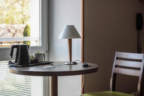 Foto de una habitación de Hotel La Métairie