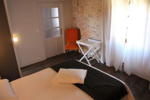 Foto de una habitación de Hotel Priorato del Val