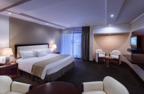 Foto de una habitación de Hotel Akros