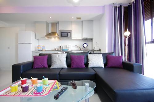 Foto de una habitación de Apartamentos City Beach Lluch