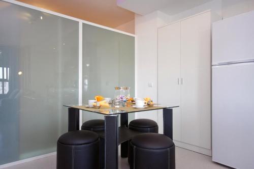 Foto de restauración de Apartamentos City Beach Lluch