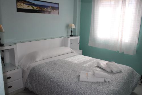 Foto de una habitación de Apartamento El Atardecer cerca del mar