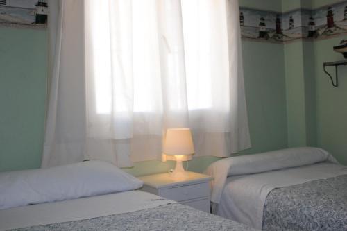 Foto de una habitación de Apartamento El Atardecer cerca del mar
