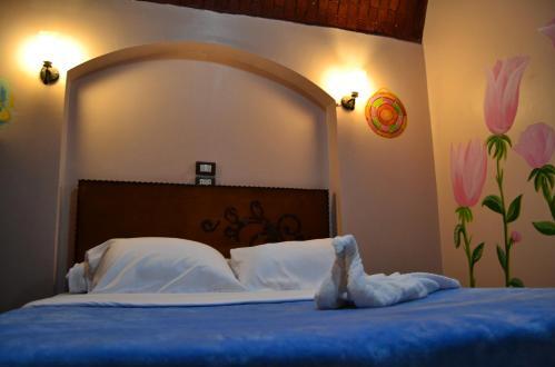 Foto de una habitación de Tuya Hotel