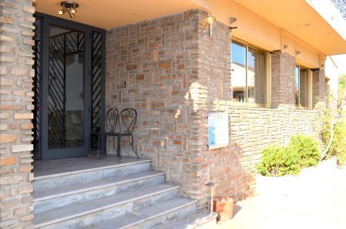 Foto del exterior de Hôtel Aiglon Bylitis