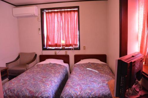 Foto de una habitación de Hotel Sejour Mint