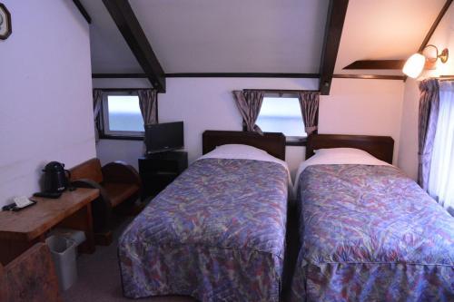 Foto de una habitación de Hotel Sejour Mint