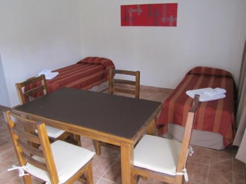Foto de una habitación de Aitué Apart Hotel