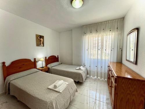 Foto de una habitación de Alquileres Vacacionales Mariscal 1 - Aloturin Benidorm