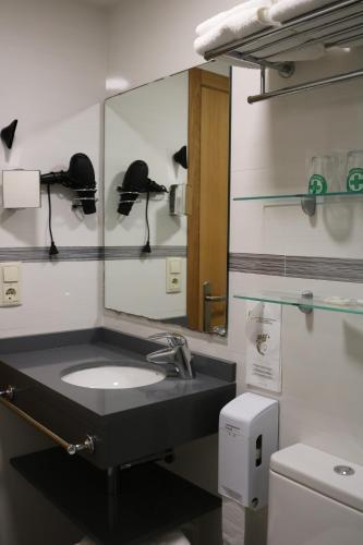 Foto del baño de Hotel Marina