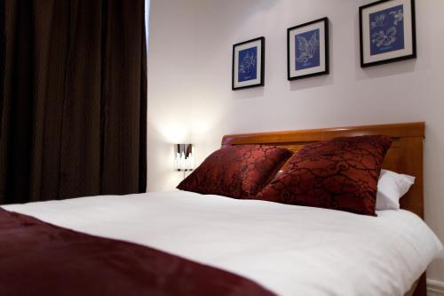 Foto de una habitación de Aparthotel Welcome Inn Victoria